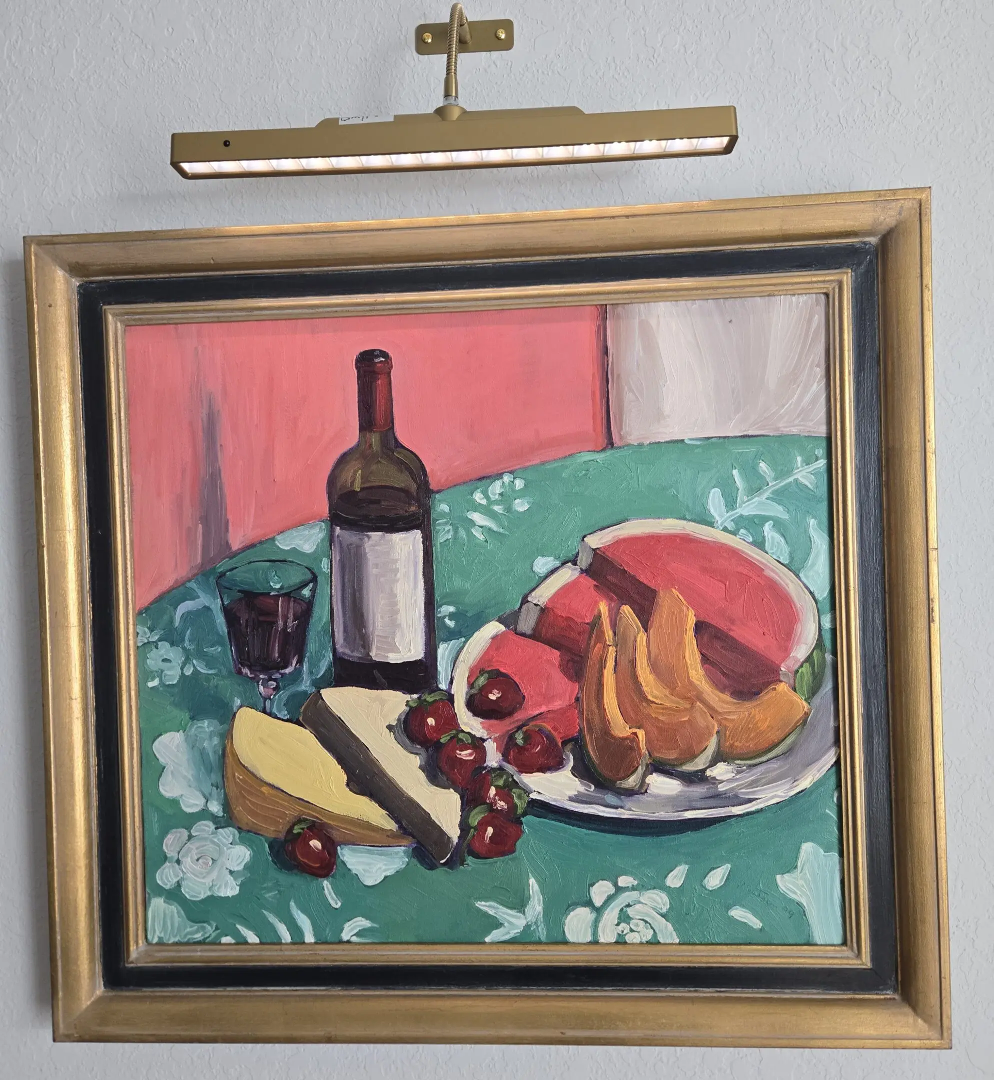 682398e5d8aab_1000005664-1 A painting of fruit and wine on the wall.